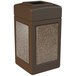 A brown rectangular Commercial Zone StoneTec waste receptacle with square panels on a counter.