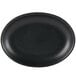 A black Hall China oval platter with a black rim on a white background.