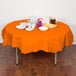 Creative Converting 923282 82" Sunkissed Orange OctyRound Tissue / Poly Table Cover Main Thumbnail 1