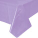A Creative Converting luscious lavender purple plastic table cover on a table.