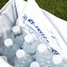 A white bag of Polar Tech Re-Freez-R-Brix freeze packs with water bottles.