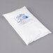 A white plastic bag with blue writing that says "Polar Tech Ice Brix" on it.