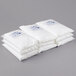 A stack of nine white Polar Tech Ice Brix cold packs.