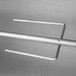 An Optimal Automatics aluminum skewer with built-in fork on one end.