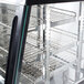 A close-up of a replacement glass side panel for an Avantco countertop food warmer.