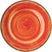 A Carlisle Mingle Fireball melamine plate with a red and orange swirl design.