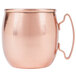 A close-up of a World Tableware copper Moscow mule mug with a handle.