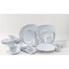 A group of Tuxton white oval china platters.