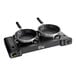 A black Choice portable double burner range with two pans on top.