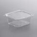 A Dart clear plastic container with a flat lid.