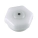 A white hexagon-shaped fastening nut with a black circle inside.
