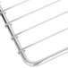A chrome-plated wire rack with a handle.