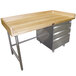 An Advance Tabco wood baker's table with a galvanized base and drawers.