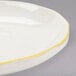 4 1/2" Ivory (American White) Scalloped Edge China Saucer with Gold Band - 36/Case Main Thumbnail 4