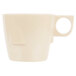 A tan melamine cup with a handle.