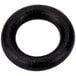 A black rubber o-ring with specks.