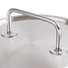 A Vollrath stainless steel pan cover with a metal loop handle.