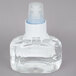 A clear bottle of Purell foaming hand sanitizer with a white cap.