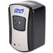 A black and silver Purell® touchless hand sanitizer dispenser.