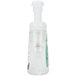 A clear plastic container of GOJO Green Certified foaming hand soap with a white pump.