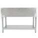 An Eagle Group stainless steel hot food table on legs with a shelf.