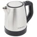 A silver stainless steel Hamilton Beach electric kettle with a black handle.
