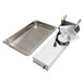 A rectangular metal tray with a wire rack holding a stainless steel cafeteria pan.