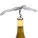 A Franmara Duo-Lever waiter's corkscrew with a stainless steel body and Smart Kut cutter opening a bottle of wine.
