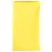 A folded yellow Intedge cloth napkin.