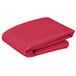 A stack of folded hot pink Intedge table covers.