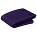 A folded purple Intedge table cover.