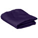 A folded purple cloth on a white background.