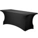A black Snap Drape Contour table cover with a curved edge.