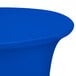 A royal blue spandex Snap Drape Contour cover on a round table.