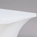 A white table top with a white Snap Drape Contour Cover.