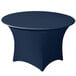 A navy blue Snap Drape Contour spandex table cover on a round table.