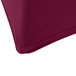 A burgundy Snap Drape spandex table cover with a zipper.