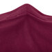 A burgundy Snap Drape spandex table cover.