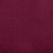 A close up of a burgundy Snap Drape spandex fabric.