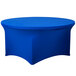 A royal blue Snap Drape Contour spandex table cover on a round table.
