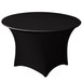 A black Snap Drape Contour spandex table cover on a round table.