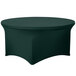 A Snap Drape hunter green spandex table cover on a round table.