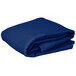 A stack of folded royal blue rectangular table cloths on a white background.