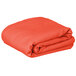 A folded orange Intedge rectangular cloth table cover on a white background.