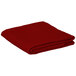 A folded red Intedge square table cover on a white background.