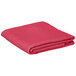 A folded hot pink Intedge table cover.