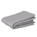 A stack of folded grey Intedge table covers.