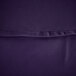 A close up of a purple polyester table cover with a hemmed edge.