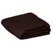 A folded dark brown Intedge rectangular cloth table cover.