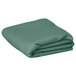 A folded seafoam green rectangular cloth table cover on a white background.